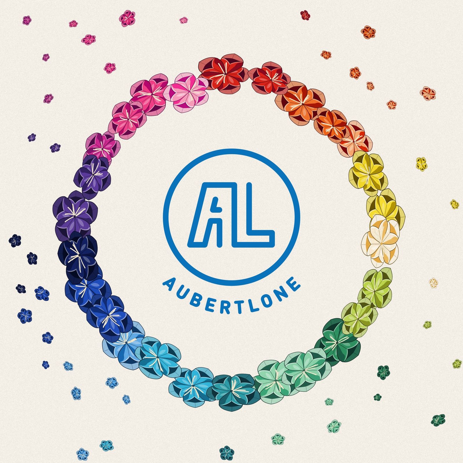 Saturater cover: a rainbow wreath of paper flowers around the aubertlone badge